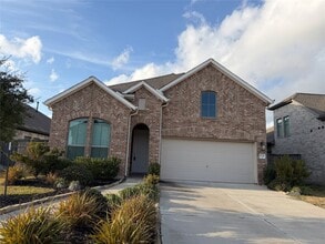 Building Photo - 8711 Windsong Trail Dr