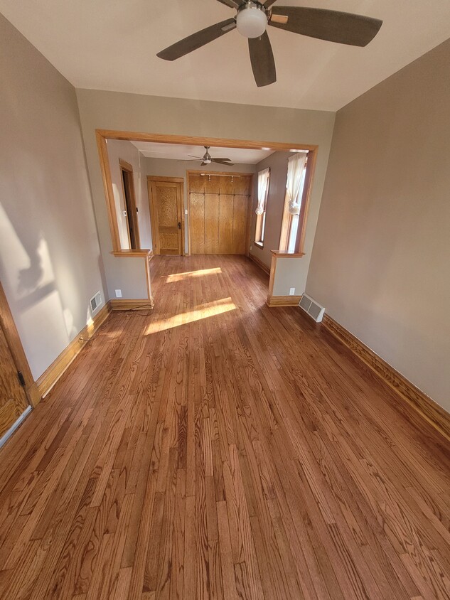 Living room and dining room - 3025 W Wellington Ave