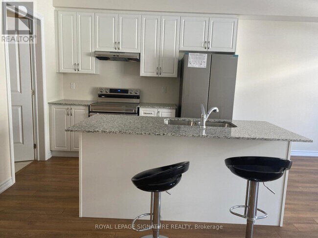 Photo du bâtiment - 110 Molozzi St