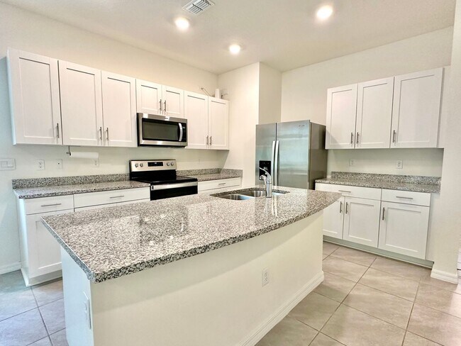 Foto del edificio - Fresh, modern & convenient 3Bedrooms/2.5Baths home in Daytona Beach!