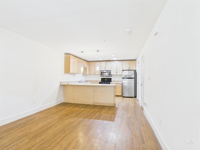 Foto del edificio - 711 W 32nd St