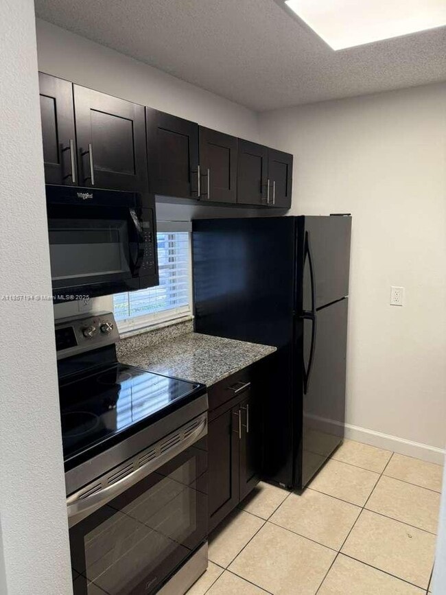 Building Photo - 8620 N Sherman Cir