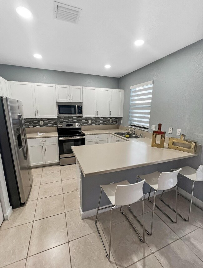 Foto del edificio - 10598 W 32nd Ln