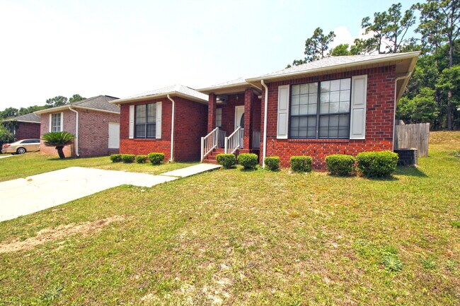Building Photo - 3BR/2BA North Pensacola Brick Home with Bonus Room, Vaulted Ceilings & Privacy-Fenced Backyard Ne...