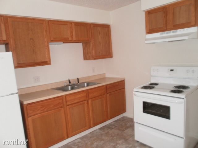 Building Photo - 2 br, 1 bath 4plex - 1403 Huntington Ave #2