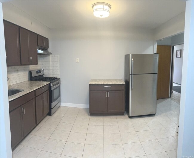 Building Photo - 59-77-77 59th Pl