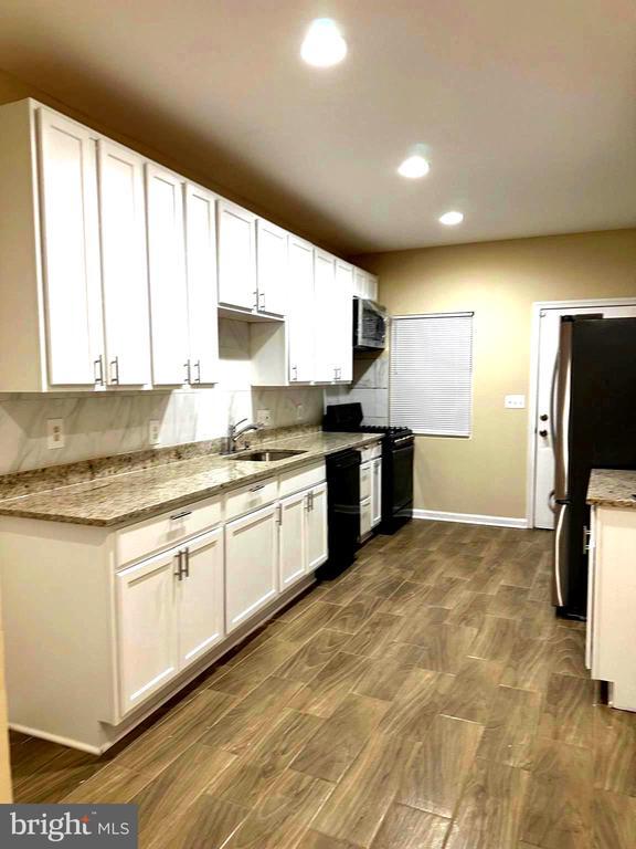 Building Photo - 335 N Stricker St