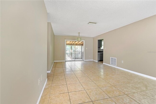 Building Photo - 951 Beau Court Orange City, FL 32763-Back Unit