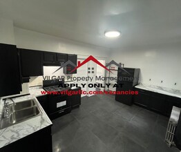 Building Photo - 5035 Olcott Ave