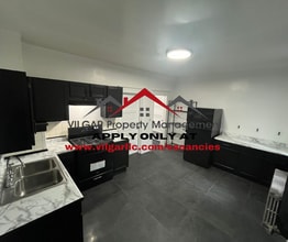 Building Photo - 5035 Olcott Ave