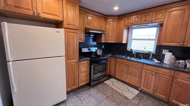 Building Photo - 22-37-37 128th St