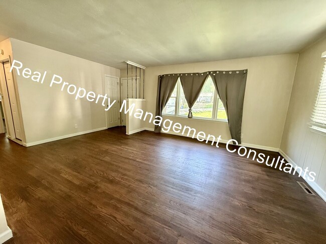 Building Photo - 2-Bedroom Home with Spacious Backyard & Deck