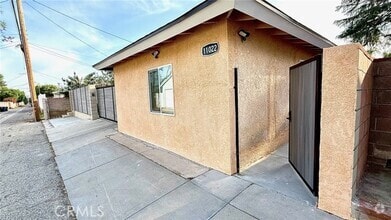 Building Photo - 11022 Louise Ave