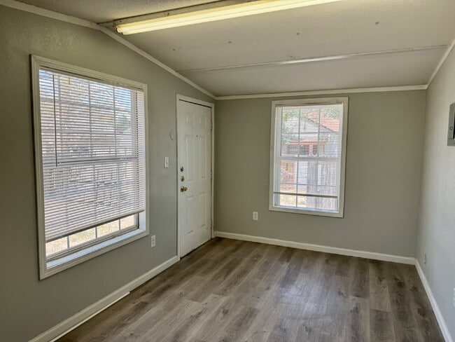 Building Photo - Move In Special: Half off the first month's rent with a 14-month lease.  Updated Rear Unit