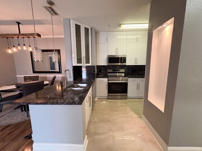 Building Photo - Available Now! Spacious 2-Bed, 2-Bath Cond...