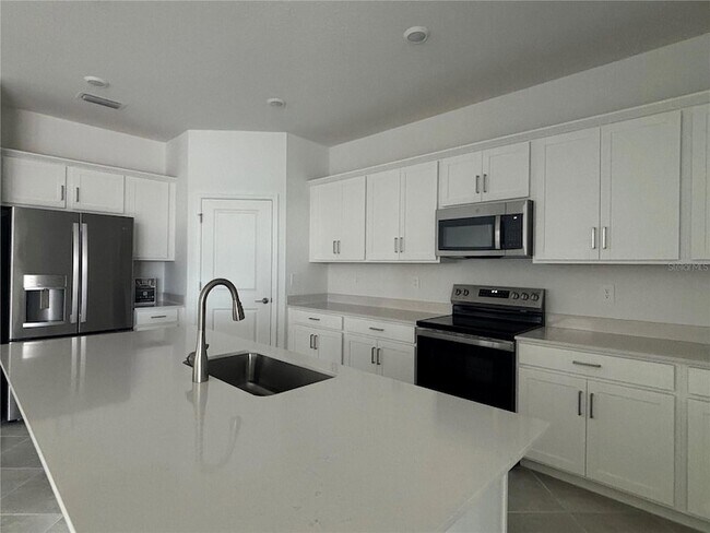 Foto del edificio - 7869 Lakes Edge Ln