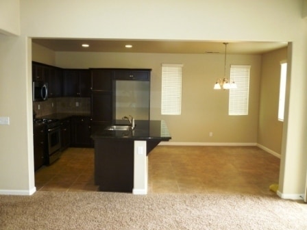 Building Photo - Fantastic Harlan Patio Home with Fenced Fr...