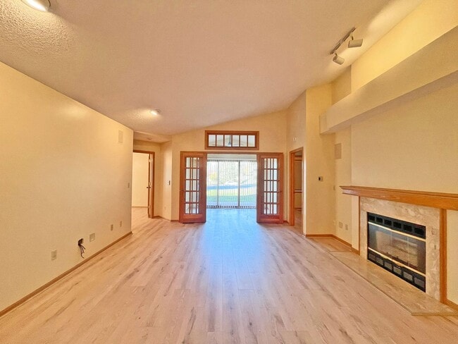 Building Photo - Luxury Maintenance-Free **One-Level Living** on Pond, Fireplace, Great Room, Primary Suite, Offic...