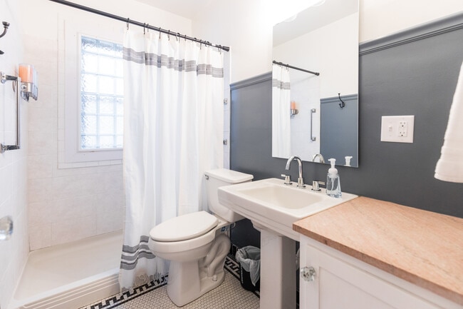 Unit 2 bathroom. Unit 1 is newly remodeled. - 1215 S Phillips Ave