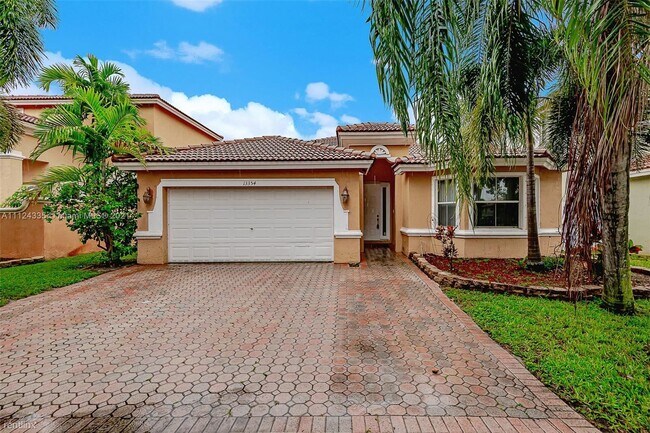 Foto del edificio - 4 br, 3 bath House - 13354 SW 26th St