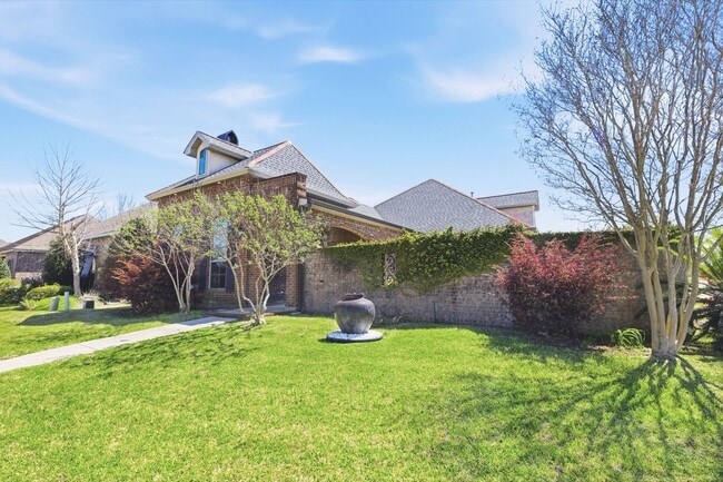 Building Photo - 1549 L'Acadie Dr