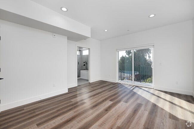 3BR, 2BA - 1,310SF - Primary Bedroom - 857 N Hayworth Ave