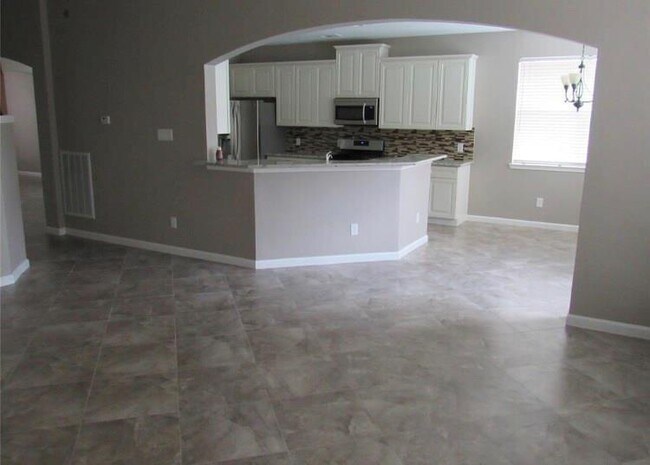 Foto del edificio - 1818 Thistle Creek Ct