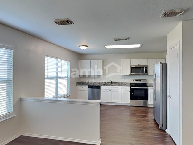 Building Photo - 6410 Flatstone Pass
