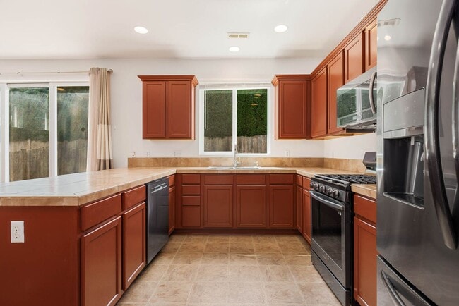 Building Photo - 3 Bedroom Home with Open Layout, Large Garage & Primary Suite