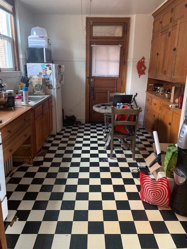 Large eat in kitchen with built in. - 3237 Lockwood N Ave