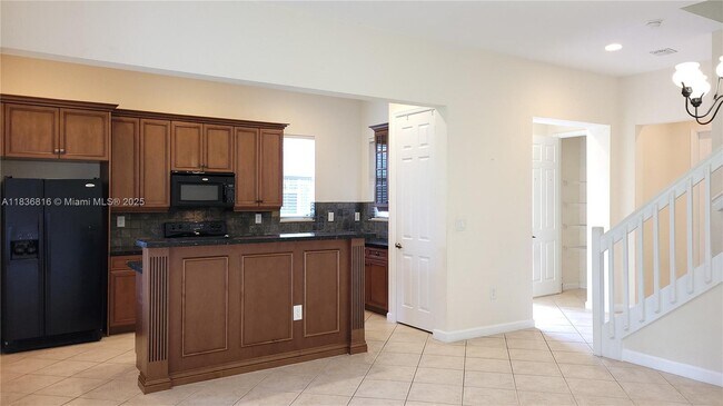 Foto del edificio - 6033 NW 118th Dr