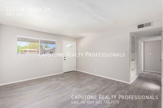 Foto del edificio - Charming 4-Bedroom Home: Modern Amenities,...