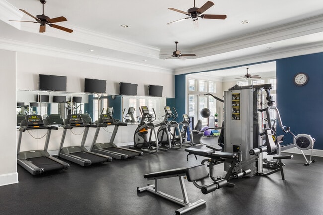 Stay active with a fully equipped fitness center right at home - Villages at Pecan Grove