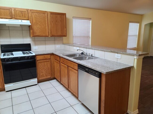 Foto del edificio - 8927 Blue Cedar Ln
