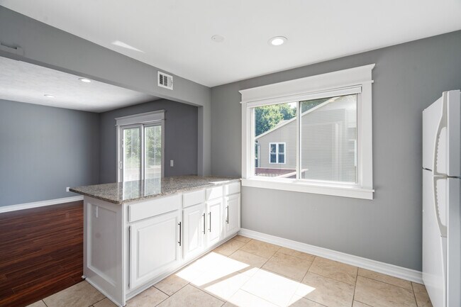 Large kitchen with granite island - 223 E Division St