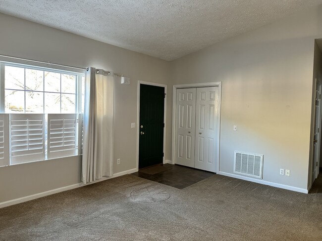 Living Room entrance with coat closet - 107 Forest Brook Dr