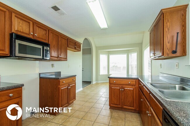 Foto del edificio - 7299 Pinnacle Oaks Dr