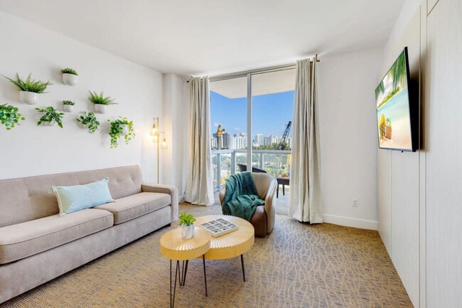 Building Photo - 18683 Collins Ave