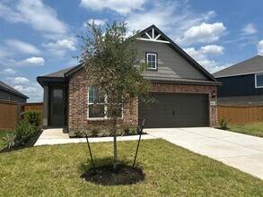 Building Photo - 1023 Whispering Winds Dr