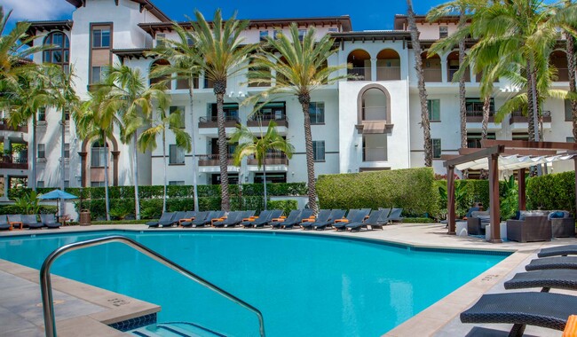Soak up the sun at the sparkling pool - Palazzo East Apartments