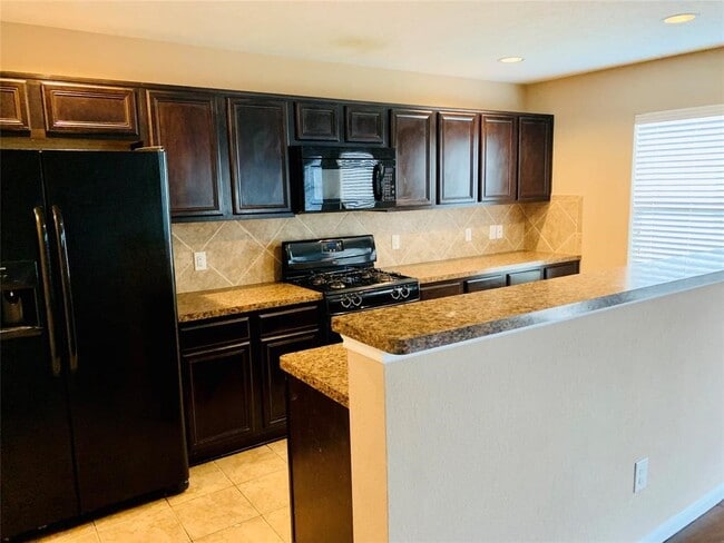 Foto del edificio - 15902 Arapaho Bend Ln