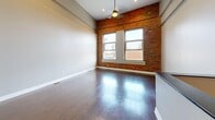This 1240 square foot property at 31 Barker Street, Buffalo, New York, offers a harmonious blend of modern amenities and classic charm. Spread across two floors, the home features 2 bedrooms and 4 bathrooms, providing ample space and privacy.

The interior showcases a mix of contemporary design and traditional elements. Exposed brick walls in some rooms add character and warmth, while sleek hardwood floors in others contribute to a modern aesthetic. Large windows allow natural light to flood the space, enhancing the open and airy feel.

The kitchen is a highlight, boasting dark wood cabinetry, stainless steel appliances, and a stylish backsplash. The layout is conducive to both cooking and entertaining, with ample counter space and a central island.

Bedrooms are generously sized, with the primary bedroom measuring 180 square feet. Plush carpeting in some areas adds comfort underfoot. The bathrooms are well-appointed, featuring modern fixtures and clean lines.

High ceilings throughout add to the sense of spaciousness, while recessed lighting provides a soft, ambient glow. The property's thoughtful design maximizes its 1240 square feet, creating a comfortable and functional living space that seamlessly blends old-world charm with contemporary convenience.