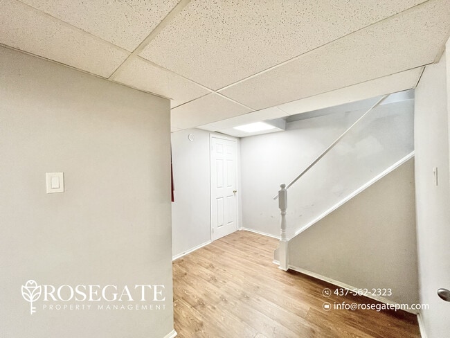 Photo du bâtiment - Bright & Modern 2-Bedroom Basement with Pa...