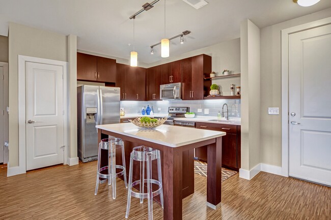 Gorgeous Quartz Countertops with Pendant Lighting - Metropolitan