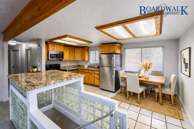 Building Photo - Spacious 5-Bedroom Home with Lofted Garage