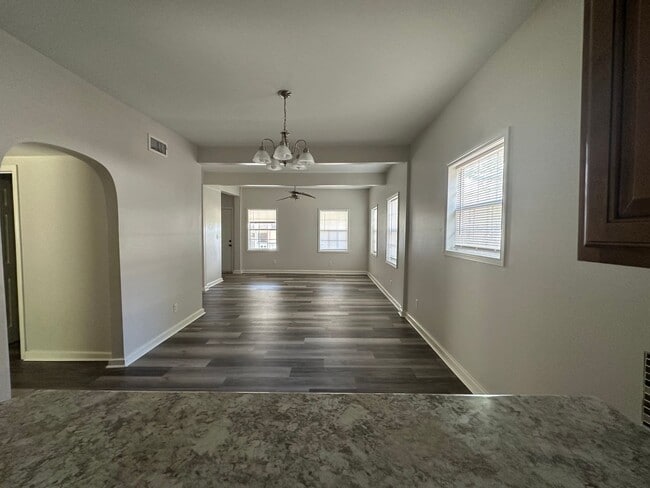 Building Photo - Welcome to this stunning 4-bedroom, 2-bath...