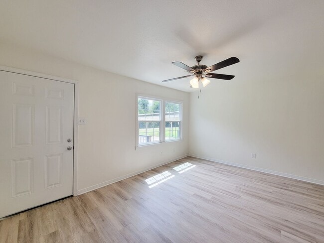 Building Photo - REMODELED 4 BEDROOM 2 BATH LEASE HOME IN A...