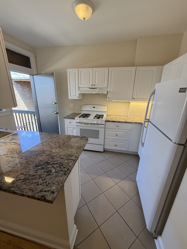 Building Photo - 1742 W Estes Ave