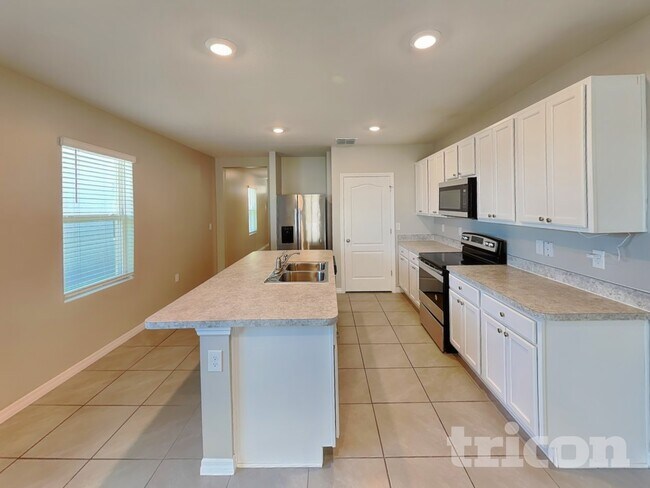 Foto del edificio - 4447 Blue Rock Dr