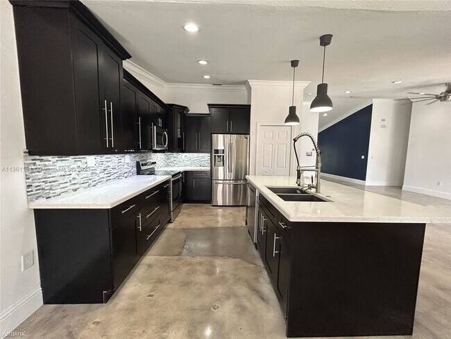 Foto del edificio - 4 br, 2 bath House - 9350 NW 34th Ct